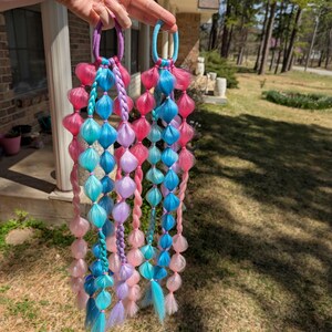 Pink, blues, and lavender bubble braids
