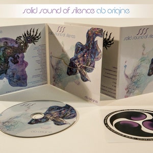 May include: A CD case with a tri-fold design featuring a colorful, abstract illustration of a fish. The case is titled "Solid Sound of Silence" and the artist is "ab origine".
