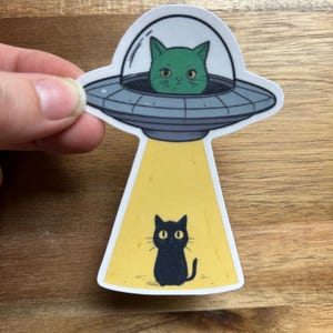 UFO cat sticker | Extraterrestrial | Cat abduction sticker | Alien cat sticker | Matte vinyl sticker | Waterproof sticker | Die cut sticker