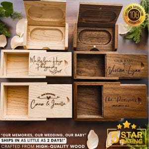 May include: Four wooden boxes with engraved text. The boxes are made of light and dark wood. The text on the boxes includes "Our Memories", "Our Baby", "The Pearsons", and "Madalynn Hayes Photography".