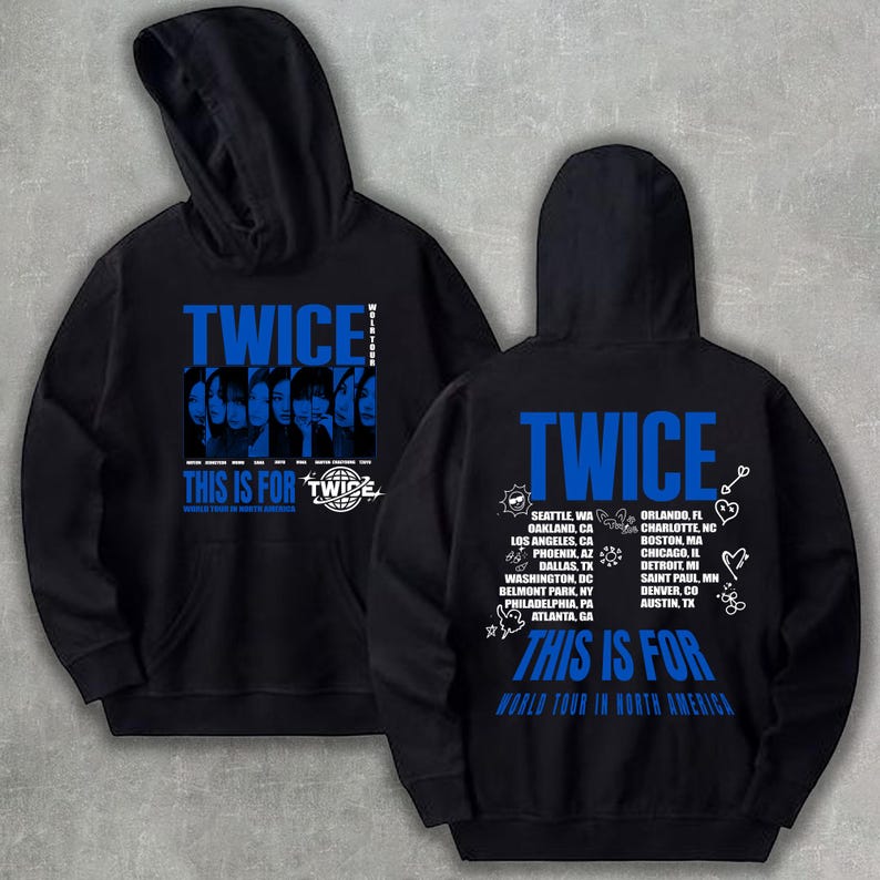 May include: Black hoodie with blue text and graphics. The front features the word "TWICE" and the phrase "THIS IS FOR TWICE" with a graphic of faces. The back displays "TWICE", a list of cities, and "THIS IS FOR WORLD TOUR IN NORTH AMERICA".