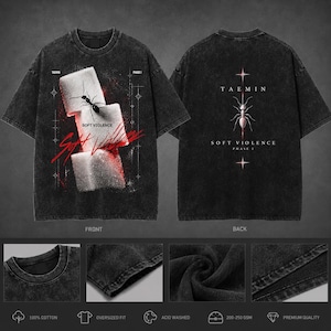 May include: A black acid-washed t-shirt featuring a front graphic of three sugar cubes with an ant and the text "SOFT VIOLENCE". The back displays a centered ant illustration with the text "TAEMIN" and "SOFT VIOLENCE PHASE 1" in white lettering.