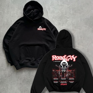 May include: Black hoodie with a red "Road to" graphic on the back. The graphic features a cityscape with the text "xikers" and a list of cities including Atlanta, Dallas, Fort Worth, New York, Los Angeles, and more.