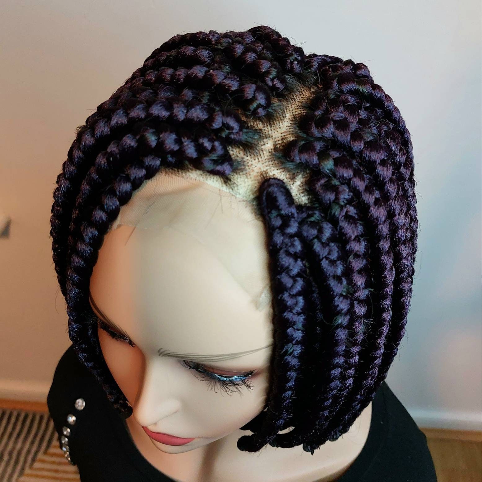 Image of Woman with blunt cut bob hair braided