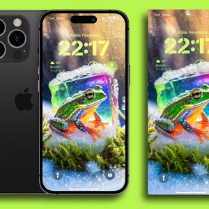 Könnte beinhalten: Schwarzes iPhone mit einem Bildschirm, der ein farbenfrohes Froschbild zeigt. Der Bildschirm zeigt die Uhrzeit 22:17 mit Wetterdetails. Die Rückseite des Telefons hat eine Kameraanordnung und das Apple-Logo. Der Hintergrund ist leuchtend grün.