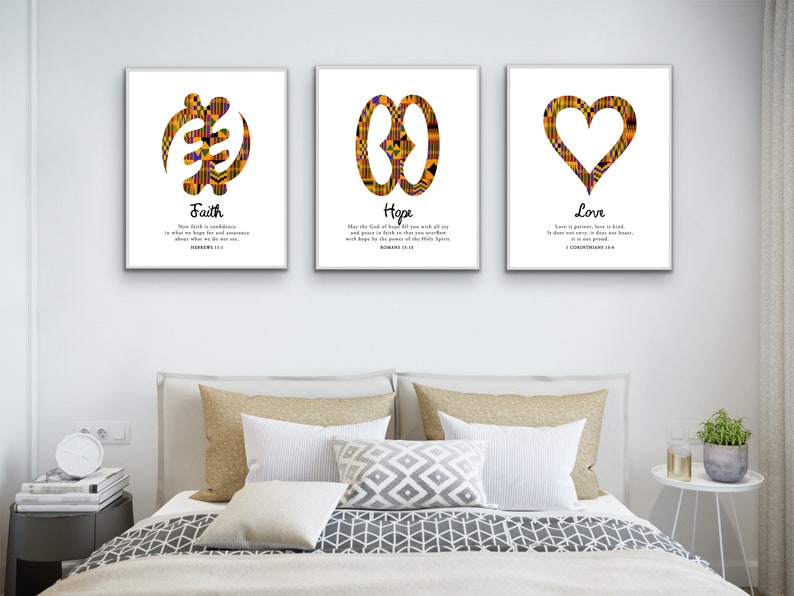 May include: Three framed prints with African Adinkra symbols and inspirational quotes. The symbols are Faith, Hope, and Love. Each print has a white background and black text.