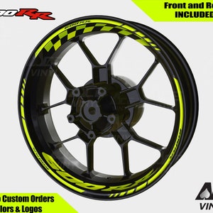 May include: Yellow and black chequered motorcycle wheel rim decals with the text "600RR" on the rim.  Front and rear decals are included.  Ace Vinyl.