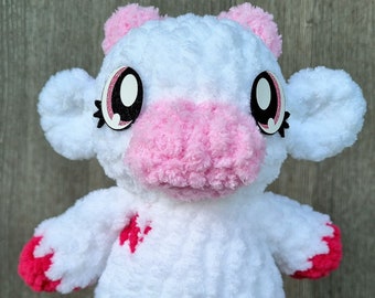 Crochet fuzzy cow plushie