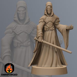 May include: A brown painted miniature figure of a hooded figure holding a lightsaber. The figure is wearing a long robe and has a mask covering their face. The figure is standing on a round base.