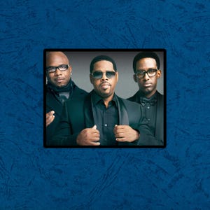 May include: A framed image featuring three men in formal attire. The men are wearing black suits, dress shirts, and sunglasses or eyeglasses. The background is a gradient of gray. The frame is black, and the background is a textured blue.