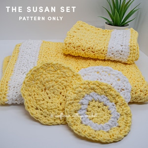 May include: A set of crocheted items in yellow and white, including a large towel, two smaller towels, and two round washcloths. The text "THE SUSAN SET PATTERN ONLY" is visible in the top left corner of the image.