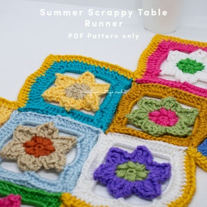 May include: A colourful crochet table runner made with squares featuring different flower designs. The runner is made with a variety of colours, including yellow, blue, green, pink, and purple. The text "Summer Scrappy Table Runner PDF Pattern only" is visible in the image.