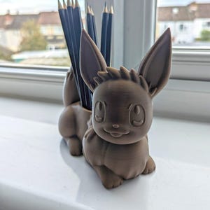Organizador de escritorio impreso en 3D inspirado en Pokémon, portalápices de Eevee, ideal para escritorios y oficinas en casa.