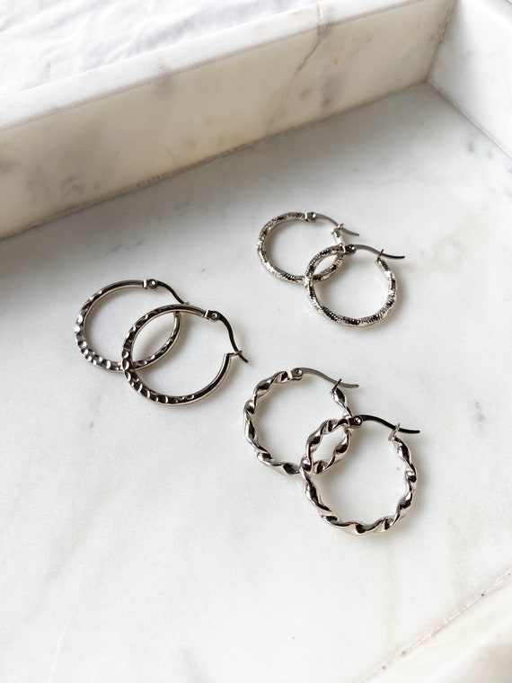 Celine twisted hoop earrings new arrivals
