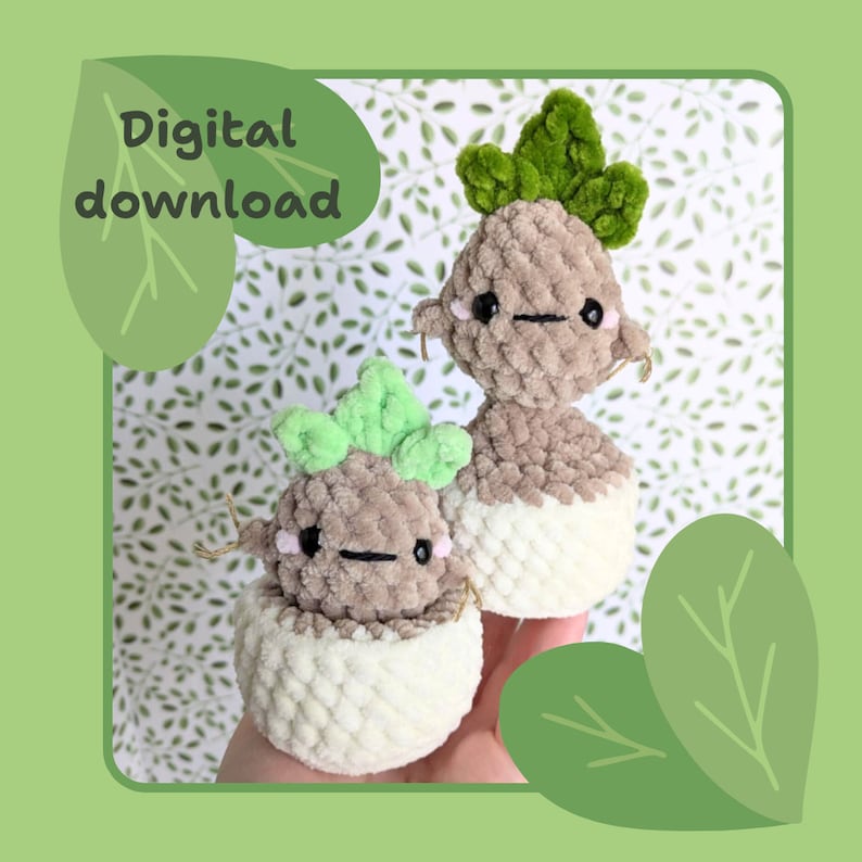 May include: Two crocheted amigurumi root vegetables with green tops. The roots are brown and the tops are green. The roots are sitting in white crocheted pots.