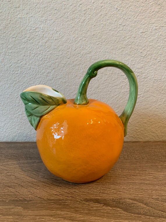 Vintage ceramic orange pitcher Etsy