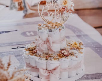 Tarta de pañales en color rosa suave para niñas