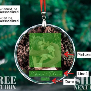 May include: A clear glass ornament with a photo of a couple hugging. The ornament is personalized with the text "Edward & Sharon" and the year "2023".