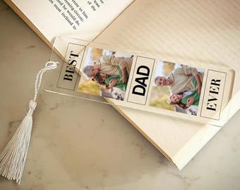 May include: A clear acrylic bookmark with two photos of a father and child. The bookmark has the text "Best Dad Ever" printed on it.