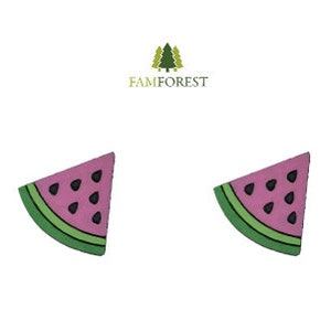 May include: A pair of watermelon slice shaped earrings. The earrings are pink with black seeds and green edges.