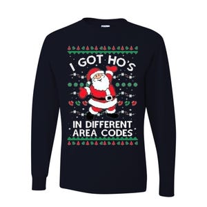 May include: Navy blue long-sleeve shirt with a Santa Claus graphic and the text "I GOT HO'S IN DIFFERENT AREA CODES". The Santa graphic is wearing a red suit and hat with white trim. The shirt has a crew neck and is made of a soft material.