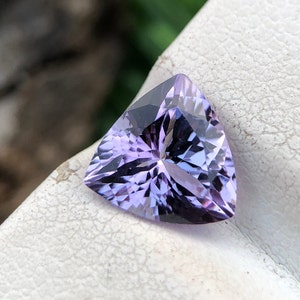 Natural And Beautiful Tanzanite Trillion Cut Purple (with Pink Shades)Colour Tanzanite Very Beautiful 1.64 Carat