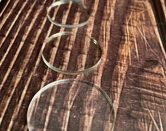 Disques en acrylique transparent (2mm) à partir de 20mm pour bijoux et créations. Cercles, ronds en plexiglass avec ou sans trou.