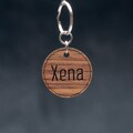 Personalized wooden medal for dog, cat, rabbit. Several species of wood. Engraved on 1 or 2 sides. product logo