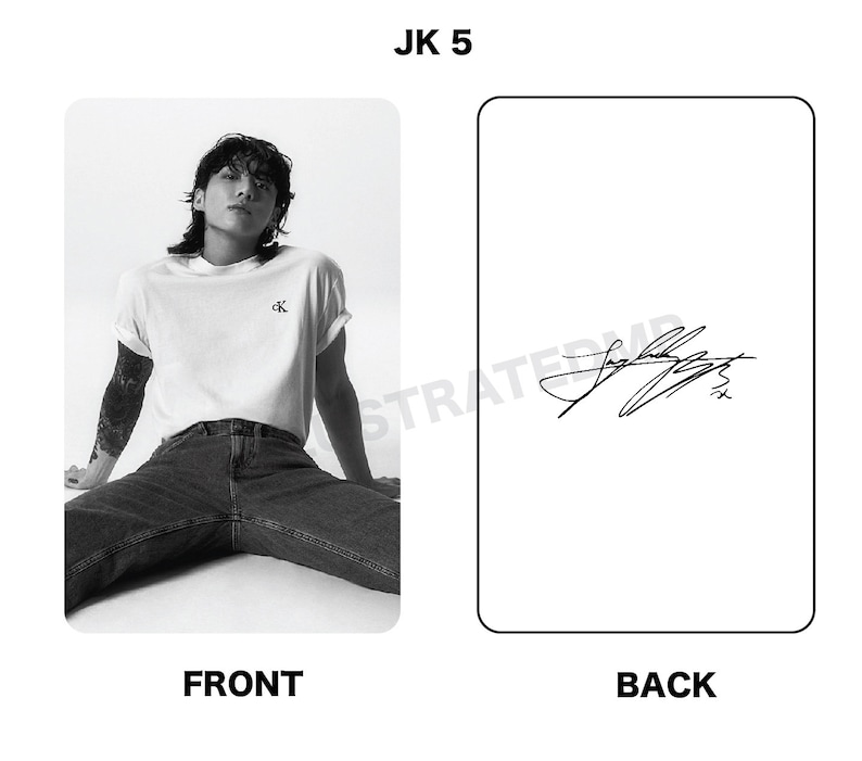 May include: Black and white photo of a person wearing a white t-shirt with a small logo and blue jeans. The person is sitting with their legs spread out. The back of the card has a black and white signature.