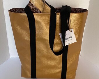 Bolso tote de piel sintética dorada metalizada con forro con estampado animal