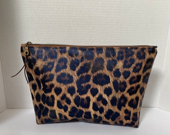 Bolsa con cremallera y estampado de leopardo: neceser y organizador de viaje
