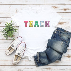 TEACH Varsity Letters DESIGN (printed) Shirt, Multi-Color Faux Chenille design (printed) TEACH T-Shirt,Cute Teacher Shirt,New Teacher Shirt