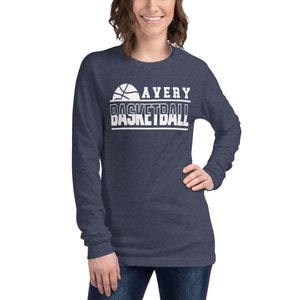 May include: A navy blue long-sleeved t-shirt with a white basketball graphic and the text "Avery Basketball".
