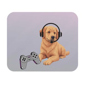 May include: A cartoon illustration of a golden retriever puppy wearing a headset and holding a grey and purple games controller. The background is a light purple colour.