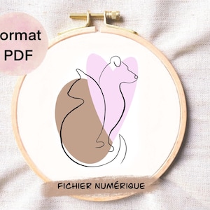 May include: Line art illustration of a dog and cat in a pink heart shape. The image is on a white background with the text "FICHIER NUMÉRIQUE" at the bottom.