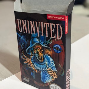 May include: A black Nintendo game cartridge box with a colorful illustration of a skeleton wearing a blue dress and a hat. The box has the title "UNINVITED" and the text "KEMCO SEIKA" on the front. The back of the box has a description of the game and the Nintendo Seal of Quality.