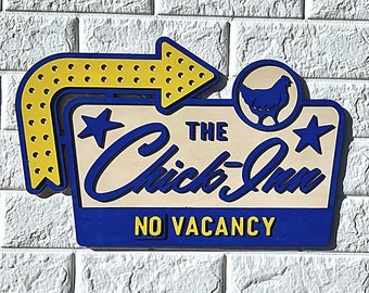 Chick-inn vacancy chicken coup wood sign.