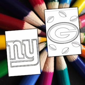 May include: Two white coloring pages with black outlines of a football team logo and the letters "NY" are displayed. The pages are surrounded by a colourful array of sharpened coloured pencils, creating a vibrant background.