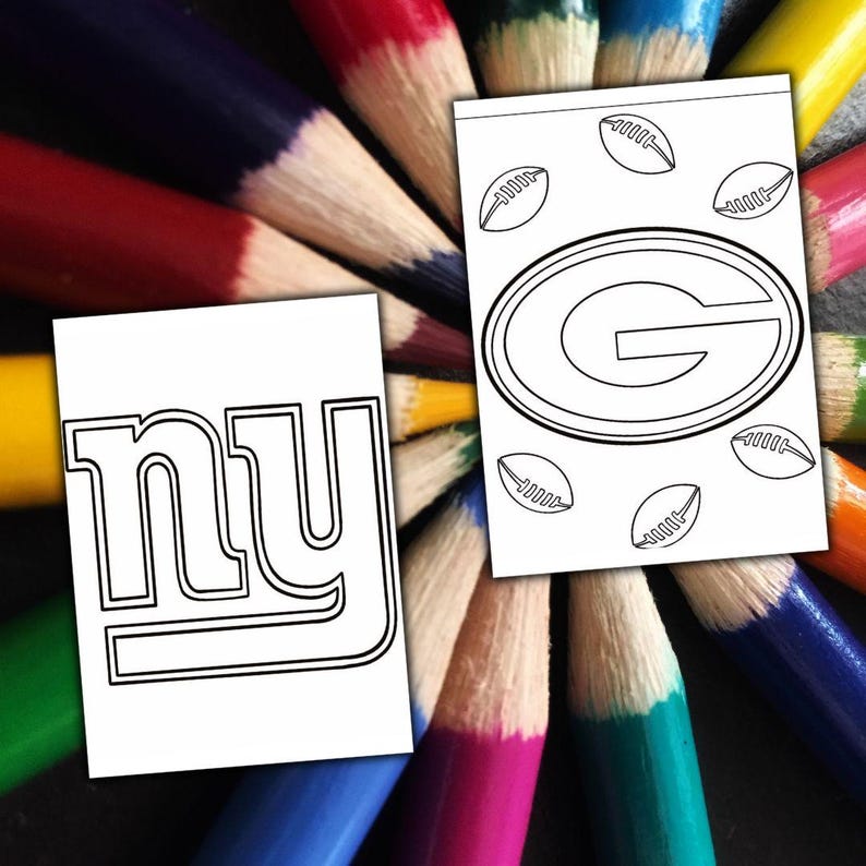 May include: Two white coloring pages with black outlines of a football team logo and the letters "NY" are displayed. The pages are surrounded by a colourful array of sharpened coloured pencils, creating a vibrant background.