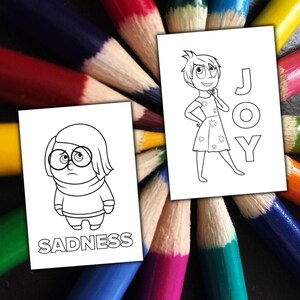 May include: Two black and white coloring pages featuring characters from the movie Inside Out. One shows a character labeled "SADNESS", the other shows a character labeled "JOY". The pages are surrounded by a fan of colorful pencils.