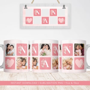 May include: White ceramic mug featuring a pink square design with photos, floral accents, and the letter "N" and "A". The mug has a handle and is decorated with images of people. A matching wall hanging is above the mug.