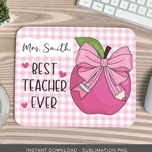 May include: Pink and white checkered mouse pad with a pink apple with a pink bow and a pencil sticking out of it. The text "Mrs. Smith Best Teacher Ever" is on the left side of the apple.