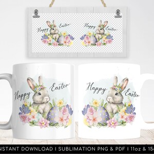 May include: White ceramic mug with a watercolor illustration of a bunny rabbit holding an Easter egg. The bunny is surrounded by pink, purple, and yellow flowers. The text "Happy Easter" is written on the mug.