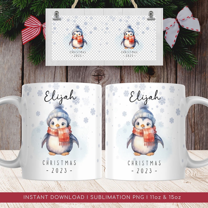 May include: A white ceramic mug featuring a penguin wearing a red and white scarf and a blue hat. The mug is personalised with the name "Elijah" and the text "Christmas - 2023 -". The mug is set against a white background with blue snowflakes.