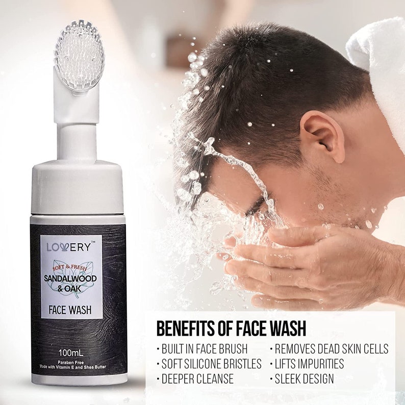 May include: A white and black face wash bottle with a built-in brush. The label reads "Soft & Fresh Sandalwood & Oak Face Wash, 100mL". The image also shows a person washing their face with water. Benefits include a built-in face brush and deeper cleanse.