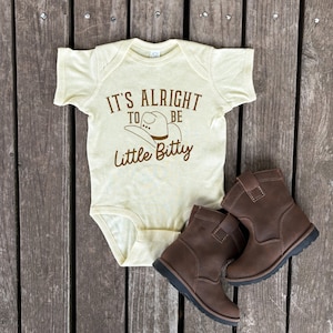 It&#39;s Alright to be Little Bitty Infant Bodysuit, Country Western Baby Bodysuit, Cute Farmer Baby, Ranch Baby, Cowboy Hat Design Baby