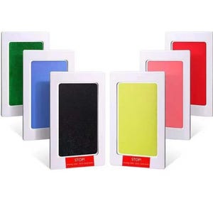 May include: Six ink pads for making baby handprints and footprints. The pads are in white frames with red "STOP" labels. The ink colors are green, blue, black, yellow, pink, and red.