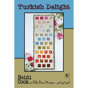 May include: A quilt pattern called "Turkish Delight" by Heidi Cook for Villa Rosa Designs. The pattern features a colorful quilt with a rainbow of colors and a bee design.