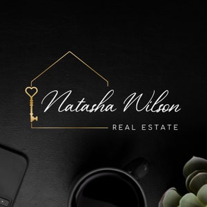 Premade Real Estate Heart Key-logo, makelaarshuis en sleutellogo-ontwerp, makelaarlogo-ontwerp, hoogwaardige branding voor makelaars in onroerend goed. afbeelding 1