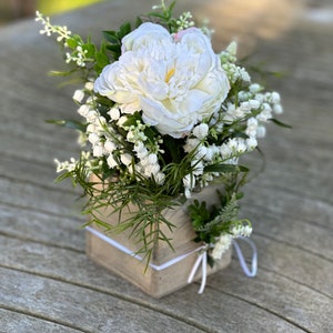 Summer arrangement with peony